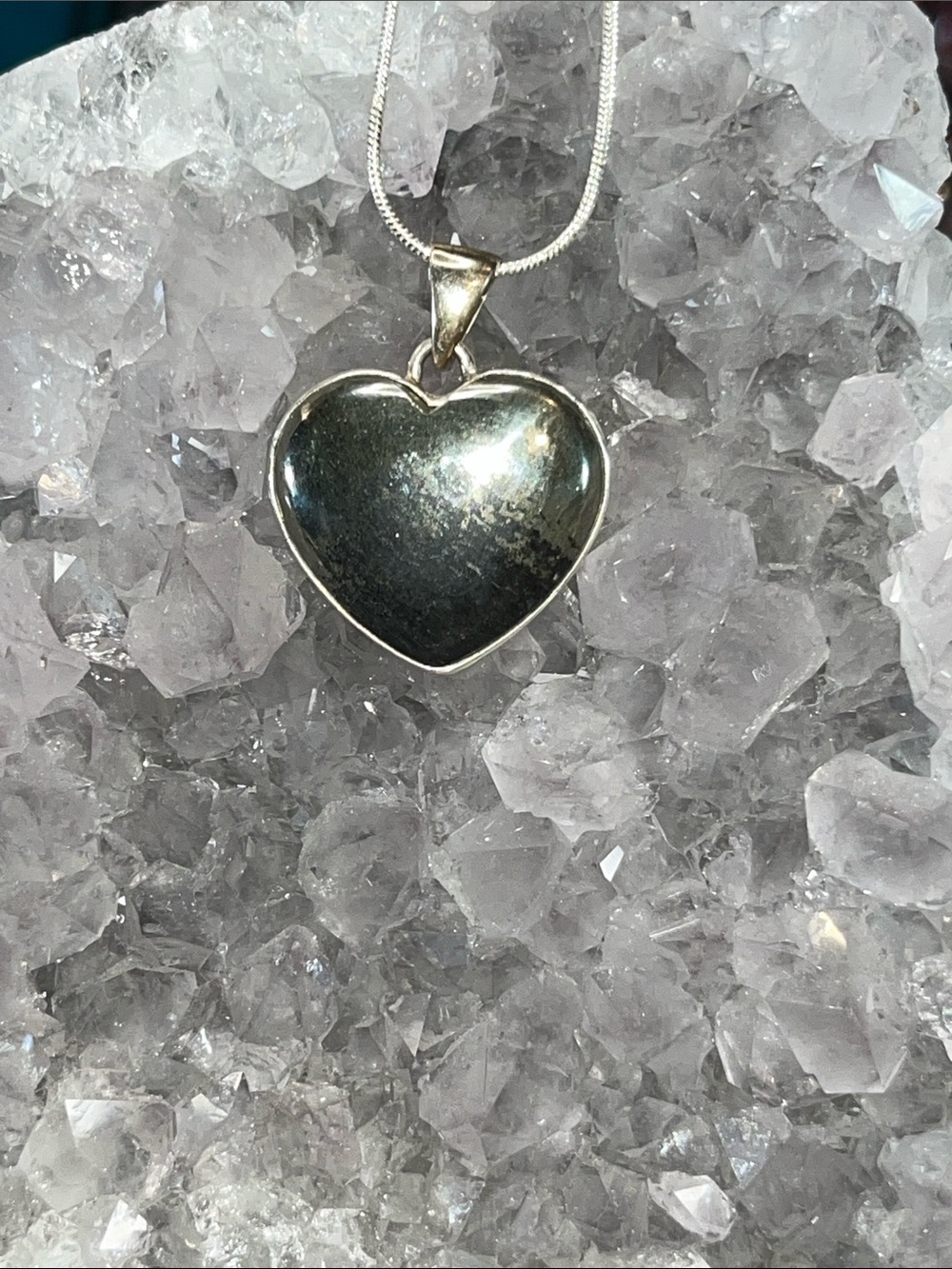 Pyrite in magnetite heart pendant